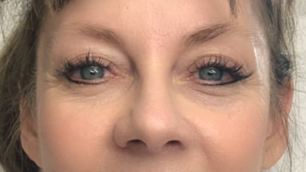 A image of woman's eyes before permanent eyebrows