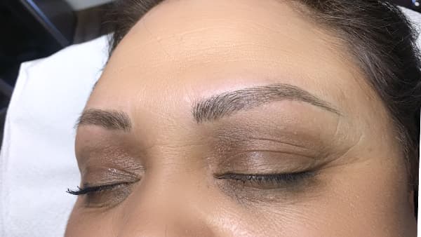 Image of eyes after permanent eyebrows